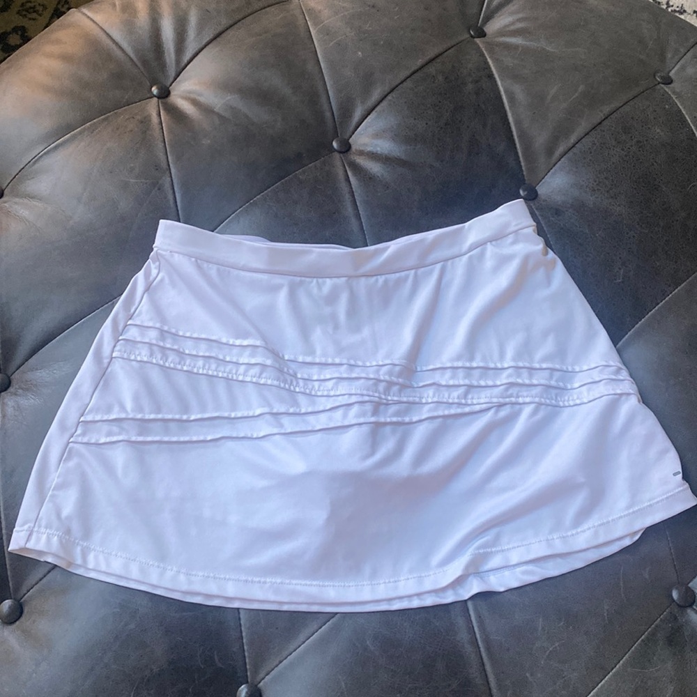 BCG white tennis skirt.